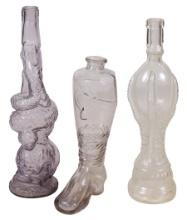 Glassware Figural Bottles (3), mold blown woman w/dolphin, turkey foot & bo