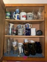 contents of cabinet drinking glasses and coffee mugs