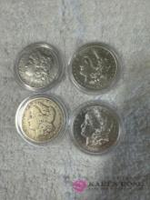 set of four early silver dollars