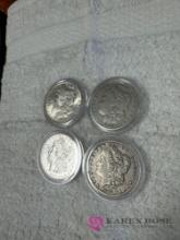 lot of four silver dollars