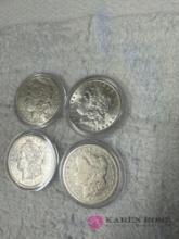 lot of four vintage silver dollars