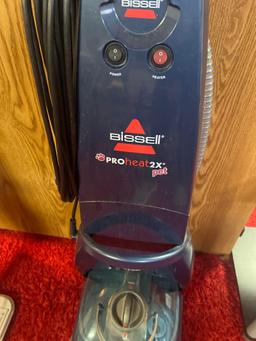 Bissell carpet cleaner in basement