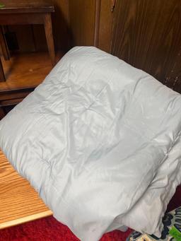 king comforter set in basement