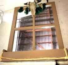 Hanging mirror with cows horns