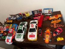 lot of loose race cars