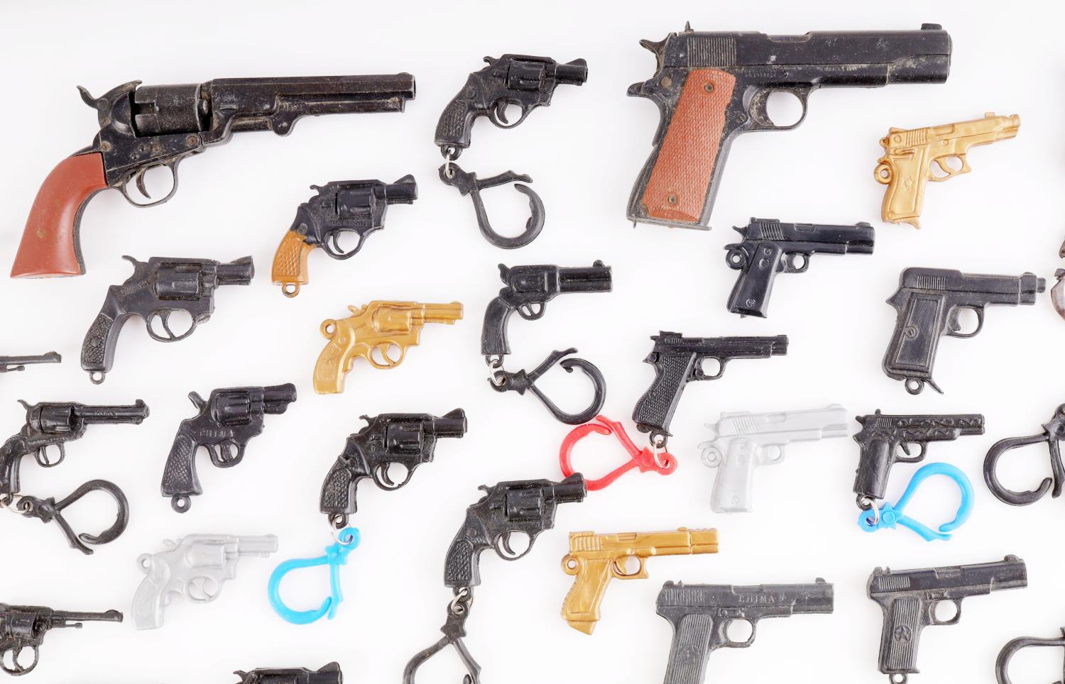 LARGE COLLECTION OF MINIATURE TOY GUN LOT