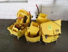 group of mop buckets