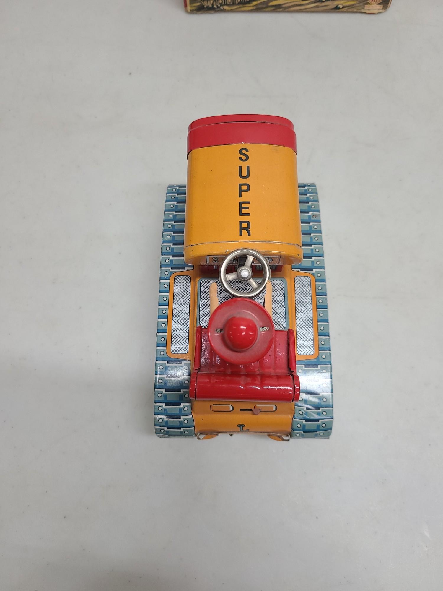 KO Battery Op Magic Action Super Tractor Tin Toy