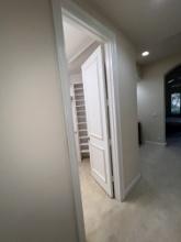 Interior Hardwood  Door To One Side Master Closet System