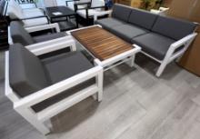 Addison, a 4 Piece Outdoor Patio Furniture Set with a 3 Seater Sofa, (2) Arm Side Chairs and a Teak
