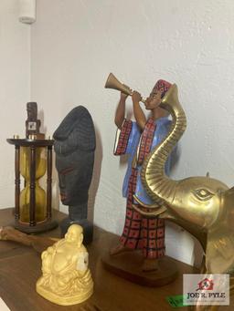 Decorator items on shelf elephant, Buddha, etc