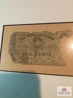 Scrap of Confederate money and Civil War stamps framed