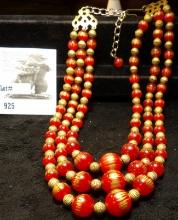 Brass & red bead necklace with a place for pendant.
