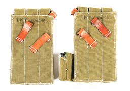 A TREASURE OF ORIGINAL MP-40 MACHINE GUN MAGAZINES, LOADERS, AND SLINGS WITH SET OF REPRODUCTION MAG