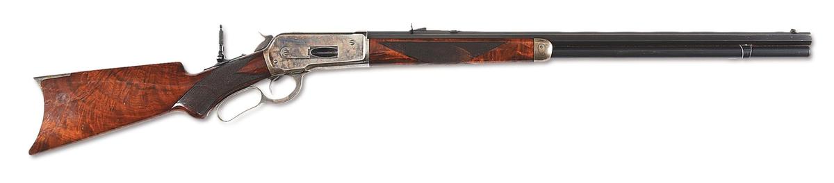 (A) FINE DELUXE WINCHESTER MODEL 1886 LEVER ACTION RIFLE IN .45-90.