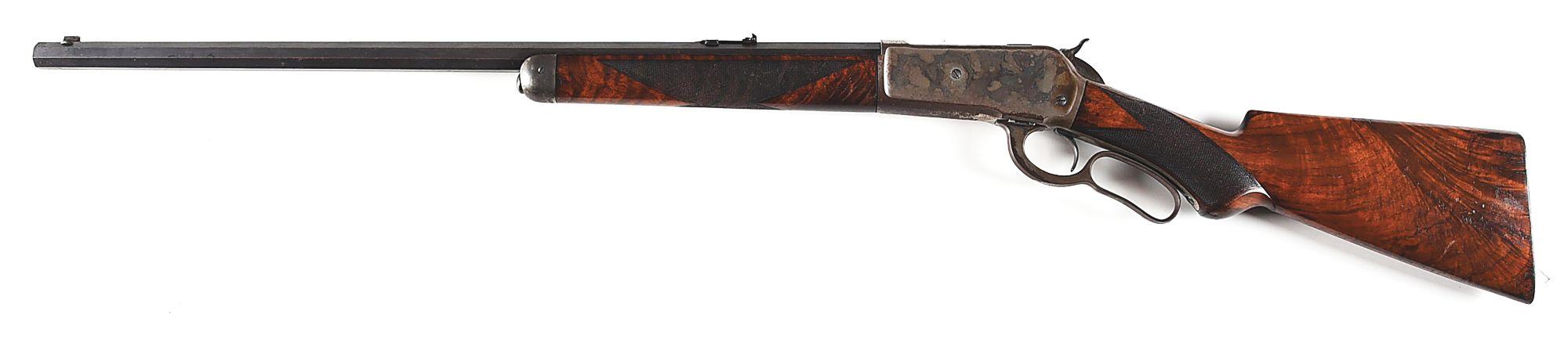 (A) DELUXE WINCHESTER MODEL 1886 LEVER ACTION RIFLE.