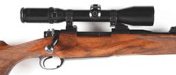 (M) DAKOTA FIREARMS 76 BOLT ACTION RIFLE IN .300 WIN MAG WITH SCHMIDT & BENDER GLASS.