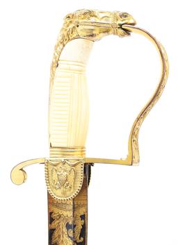 ELABORATE AND FINE AMERICAN HORSE HEAD POMMEL SABER WITH SCABBARD.