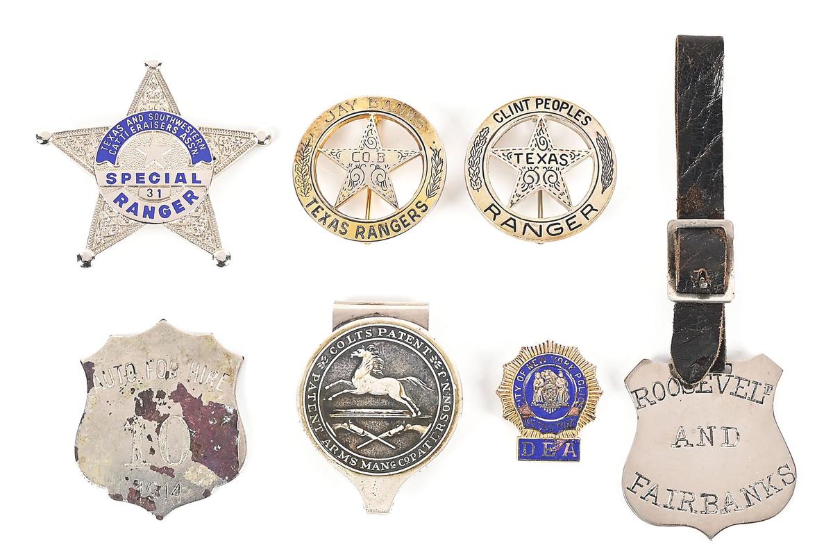 LOT OF POLICE BADGES.