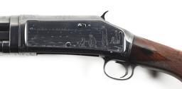 (C) FACTORY ENGRAVED PIGEON GRADE WINCHESTER MODEL 1897 SLIDE ACTION SHOTGUN.