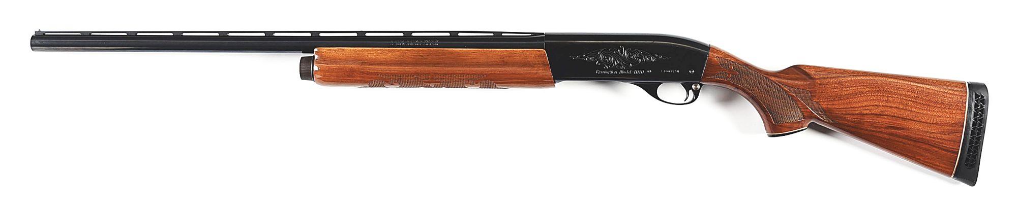 (M) REMINGTON MODEL 1100 MAGNUM SEMI AUTOMATIC SHOTGUN.