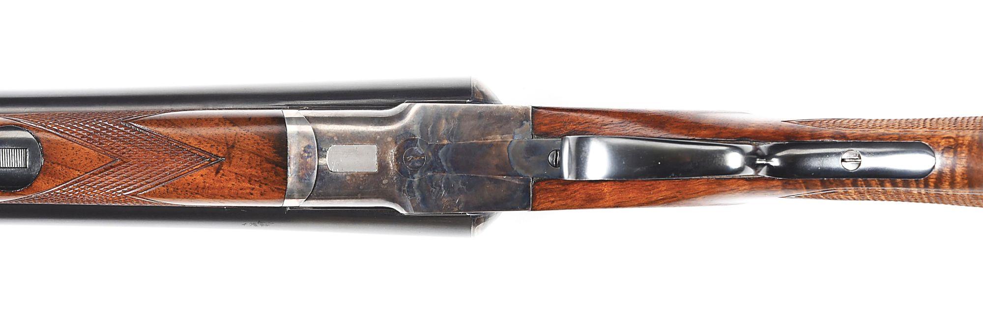 (C) L.C. SMITH 00 GRADE 12 GAUGE SIDE BY SIDE SHOTGUN IN LEG O' MUTTON CASE.