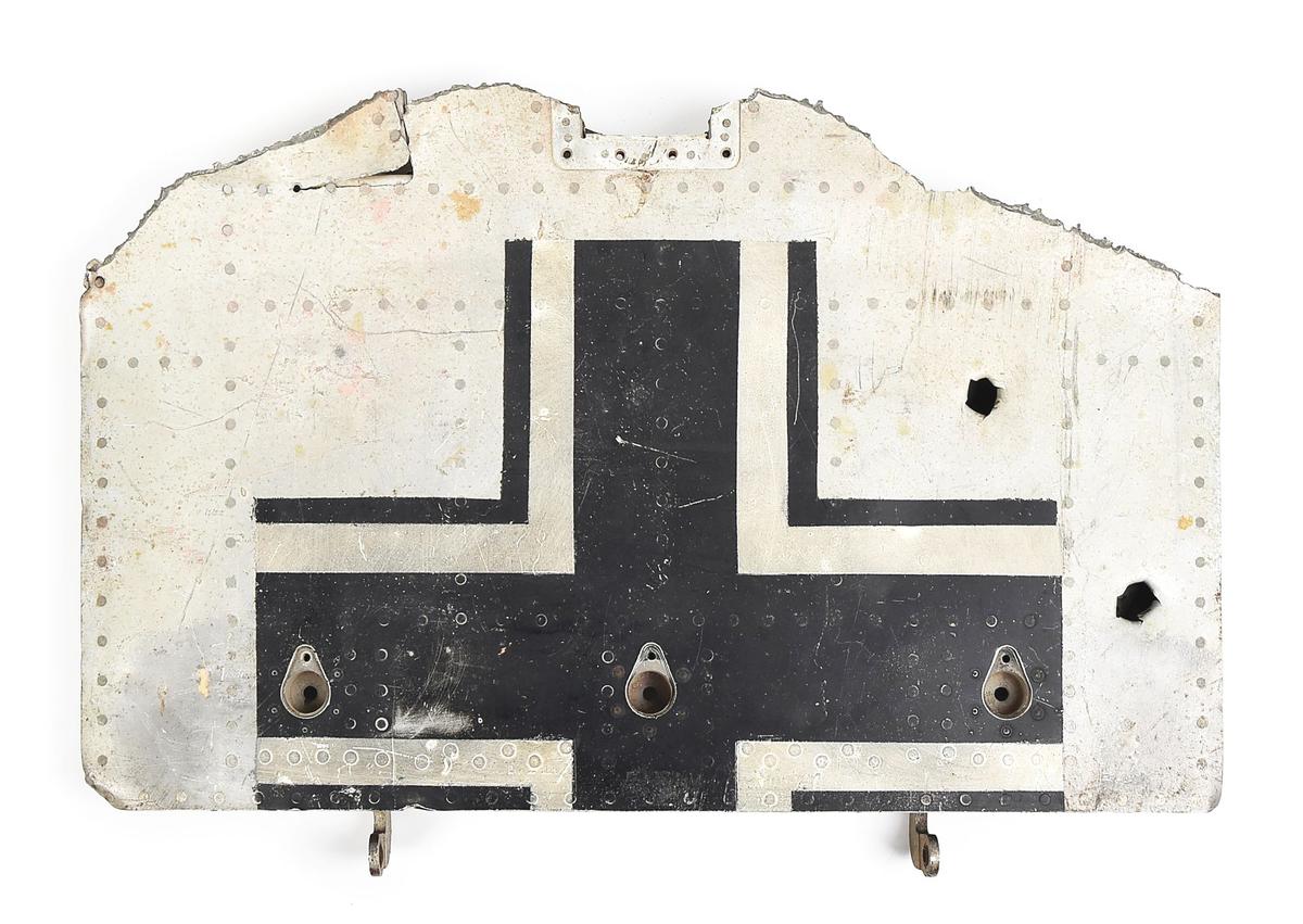 RECOVERED PANEL FROM A MESSERSCHMITT WITH BULLET HOLES.