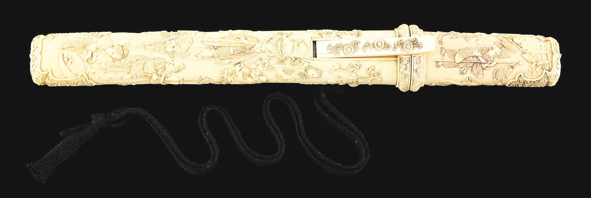 AN UNUSUALLY GOOD QUALITY IVORY MOUNTED TANTO.