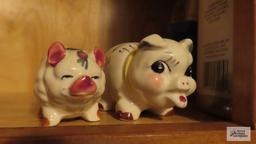 Two piggy banks, one marked Japan
