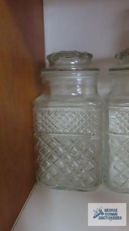 Covered glass containers