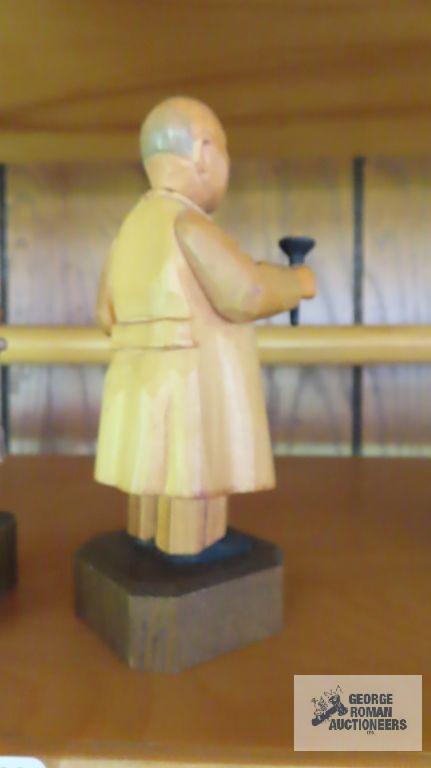 Hunter wood carved figurine and Psychiatrist figurine