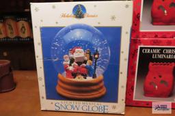 Christmas candle holders and lighted musical snow globe