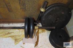 weight bar with weights in basement
