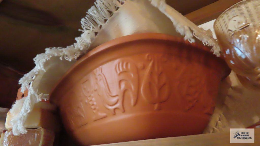 Terracotta baking dish, bath supplies and candle holder