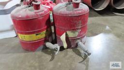 Two 5 gallon safety cans with spigots