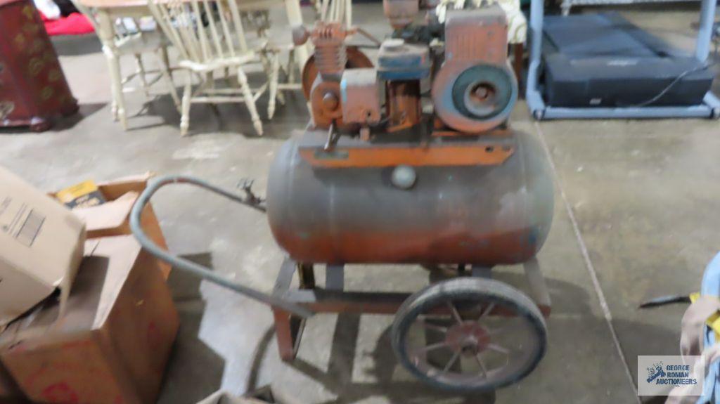 Gas air compressor on roll about cart