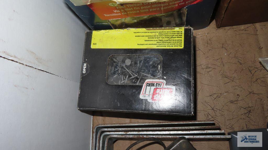 Box of hardware including hinges, nails, washers, bolts, aluminum coil, fire extinguisher