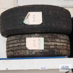 Lot of assorted tires on wooden rack