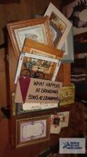 Variety of wooden signs and pictures