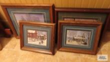 Five framed pictures of churches and horse and buggies