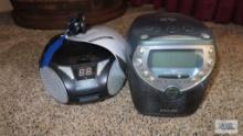 Phillips compact disc clock radio and Magnavox compact disc digital audio boombox