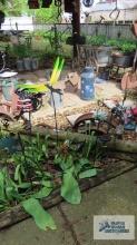 Lot of solar powered lighted yard decorations and butterfly yard decorations
