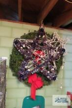 Lighted star decorations and large wreath