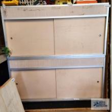 Two storage cabinets, approximately five foot long