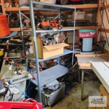 Metal adjustable shelving unit in garage
