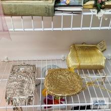 Two mesh and one gilded purse, imitation