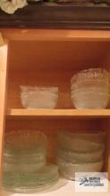 Clear glass salad bowls and plates
