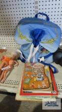 Child's life jacket and assorted books