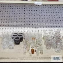 Lot of clear glass oil and vinegars, small stemware and decorative glasses