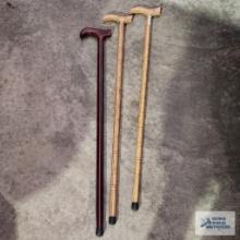 Three decorative canes